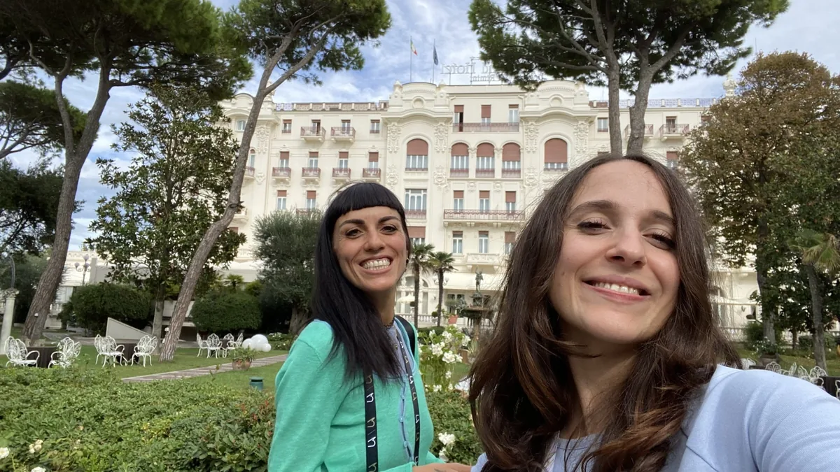 Francesca Colangelo and Giulia Mancuso of nCore HR in the garden of the Grand Hotel di Rimini