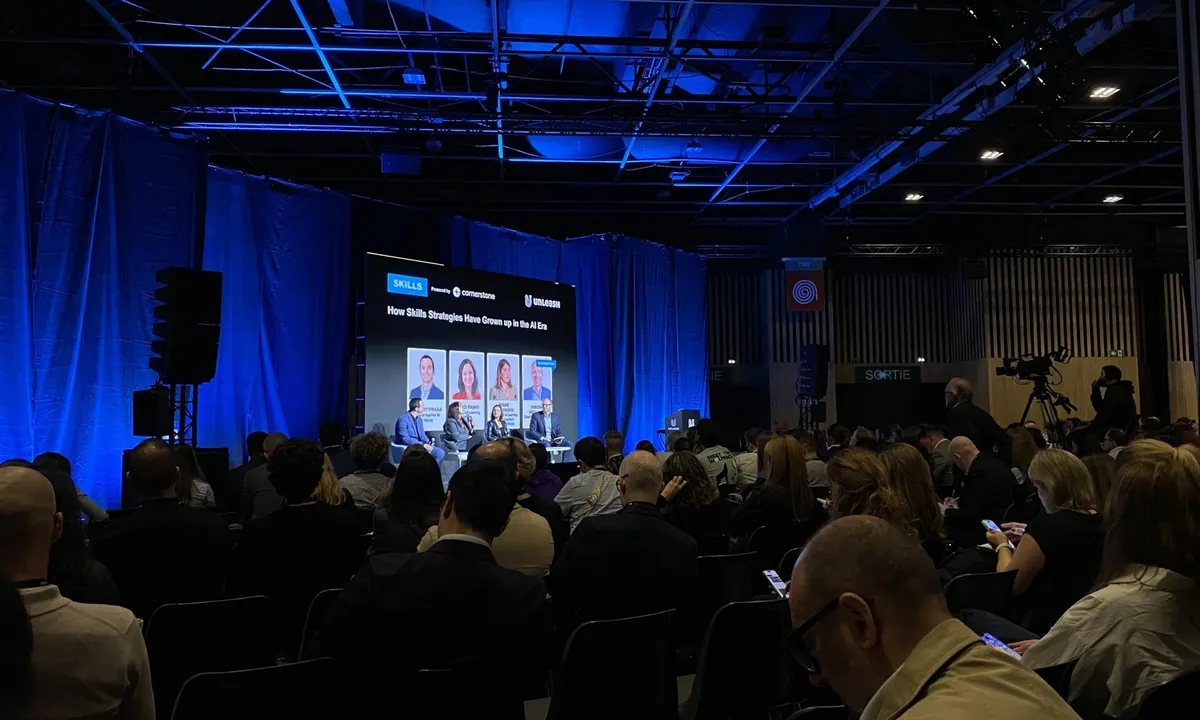 The audience in front of the stage during a talk at UNLEASH Paris 2026